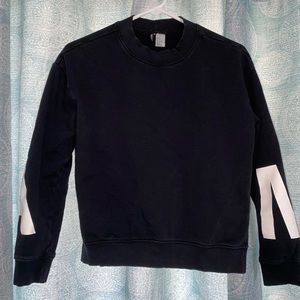 Black sweater A and M
